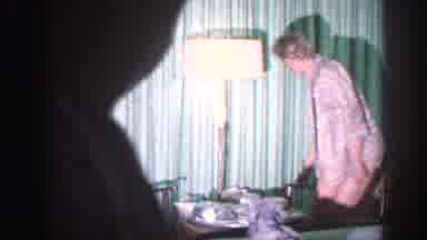 Memphis Tennessee USA (1963): People Sit Down By Window In Dark Room And Turn On