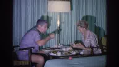 Memphis Tennessee USA (1963): Couple Eats Dinner Man Ignores Wife To Watch Tv