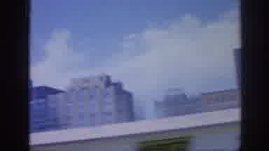 Memphis Tennessee USA (1963): Scene Of Driving Through A Downtown And Then Shot Of