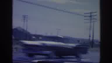 Memphis Tennessee USA (1963): A View Out Of A Moving Vehicle That Passes Buildings