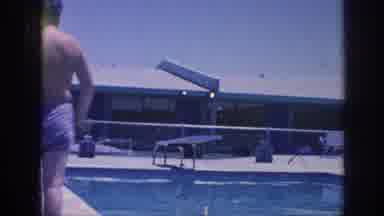 Memphis Tennessee USA (1963): Man Going For A Dive While Film Cuts To Family's
