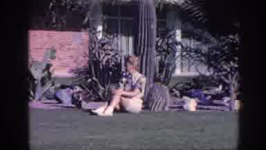 Memphis Tennessee USA (1963): A Beautiful Woman Standing By Her Boyfriend Sitting