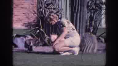 Memphis Tennessee USA (1963): Woman Wearing White Shorts Walks Away From Front