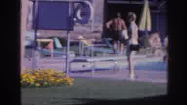 Memphis Tennessee USA (1963): A Woman Sitting Down On A Diving Board At A Pool