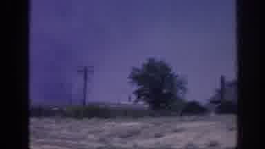 Memphis Tennessee USA (1963): There Comes A Wind Blowing Near The Field On The