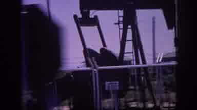 Memphis Tennessee USA (1963): Driving In A Car Through A Rural Area Past An Oil