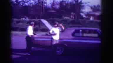 Memphis Tennessee USA (1963): People Waving At Camera While Unpacking Vehicle