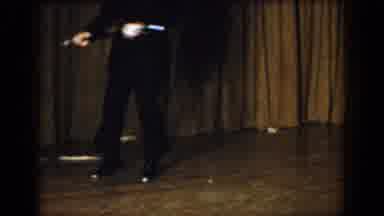 Saint Louis Missouri USA (1965): Person Tap Dancing In A Black Suit While Holding