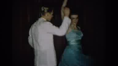 SAINT LOUIS MISSOURI USA-1965: Couple Dancing in Formal Wear at Vintage Event