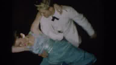 Saint Louis Missouri USA (1965): Man Dips Dance Partner Wearing Blue Dress At
