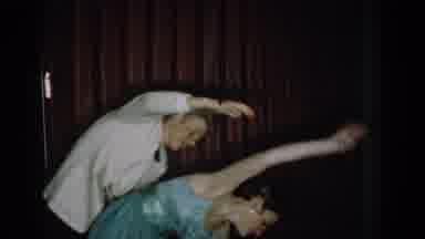 Saint Louis Missouri USA (1965): A Couple Performing Dance Moves For An Audience