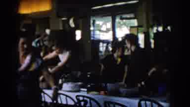 Saint Louis Missouri USA (1965): Kids Sitting And Eating At A Long Table While An