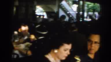 Saint Louis Missouri USA (1965): People Sitting In A Restaurant Eat At Long Tables