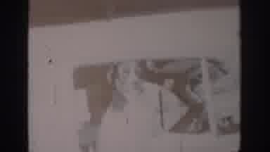 Saint Louis Missouri USA (1965): Two Children Fighting Over A Magazine While A Dog