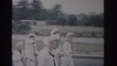 Saint Louis Missouri USA (1965): Sailors Marching Down Street Playing Several