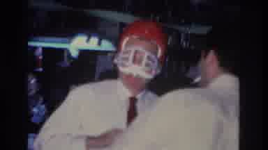Hoboken New Jersey USA (1966): Man In Business Attire Wearing A Too Small Red