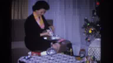 Hoboken New Jersey USA (1966): A Woman Sitting On A Living Room Couch Next To A
