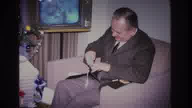 Hoboken New Jersey USA (1966): A Man Receives A Wallet For Christmas And Puts A