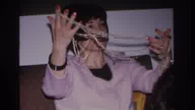 Hoboken New Jersey USA (1966): Woman Looking At String