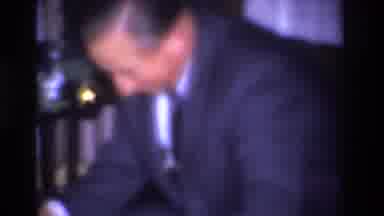 Hoboken New Jersey USA (1966): Smarty Dressed Gentleman Is Unwrapping Christmas