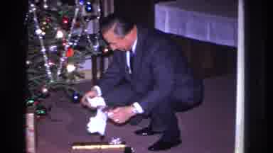 Hoboken New Jersey USA (1966): Family Unwraps Christmas Gifts