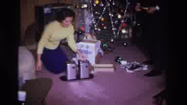 Hoboken New Jersey USA (1966): Man Women Christmas Presents Tree Happy Enjoying