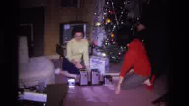 Hoboken New Jersey USA (1966): Women In Red And Yellow Opening Gift During