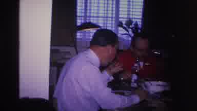 Hoboken New Jersey USA (1966): Two Men Eating At The Table In A Dining Room