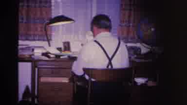 Hoboken New Jersey USA (1966): A Man Sitting At A Desk And Another Man Sitting On
