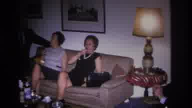 Hoboken New Jersey USA (1966): Adults Smoking At Party And Woman Driving Car