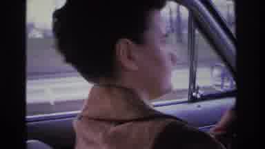 Hoboken New Jersey USA (1966): Woman Driving Rather Fast, Focused