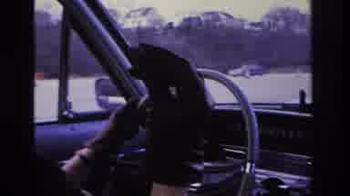 Hoboken New Jersey USA (1966): A Woman, Driving A Car, Putting Out A Cigarette On