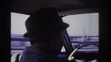 Hoboken New Jersey USA (1966): Man Driving Through City In Car
