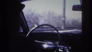 Hoboken New Jersey USA (1966): A Person Driving A Car Speedily Down The Busy