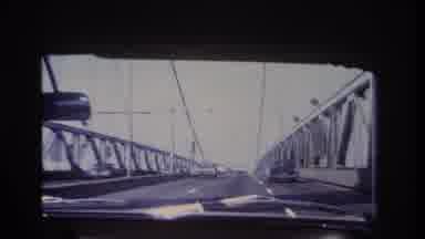 Hoboken New Jersey USA (1966): Cruising In A Car Over A Suspension Bridge With
