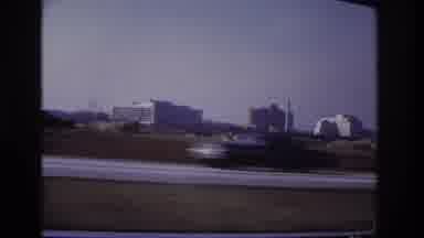 Hoboken New Jersey USA (1966): Cars Driving On A Highway By A City