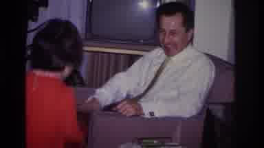 Hoboken New Jersey USA (1966): Happy Little Girl In Red Dress Climbing Up On Man's