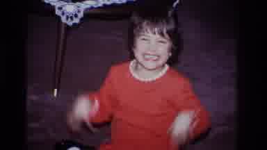 Hoboken New Jersey USA (1966): Young Boy Dressed In Red Pajamas Waving His Hands
