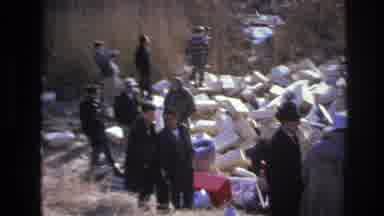 Hoboken New Jersey USA (1966): Group Of Men Looking At Overturned Shipment Of Many