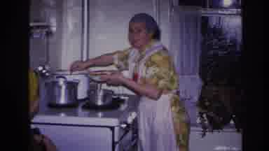 Hoboken New Jersey USA (1966): Two Women In The Kitchen Where One Is Cooking At