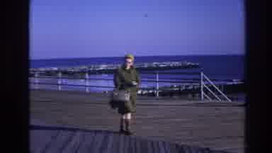 Hoboken New Jersey USA (1966): Lady Walking On The Pier Near The Water On A Windy