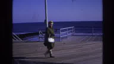 Hoboken New Jersey USA (1966): Woman Walking On A Boardwalk