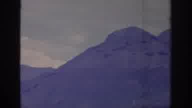 Sacramento California USA (1966): A Mountain Range Runs Under An Overcast Sky And