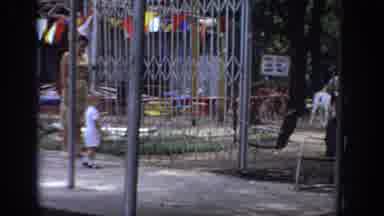 Sacramento California USA (1966): Woman Strolling With Her Son In A Collective