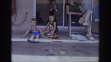 Sacramento California USA (1966): Two Little Boys Hanging Out With Mom Outside As
