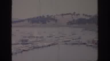 Sacramento California USA (1966): Frozen Water And Ice On Sand While Mountains