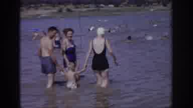 Sacramento California USA (1966): Multi-Generational Family Wading Through The