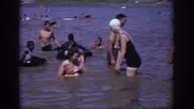 Sacramento California USA (1966): Family Swimming And Playing In Ocean