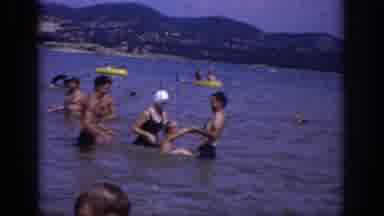Sacramento California USA (1966): Father Mother And Children Have Fun On The Beach