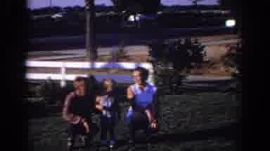 Sacramento California USA (1966): Two Parents And A Child Posing For A Picture On